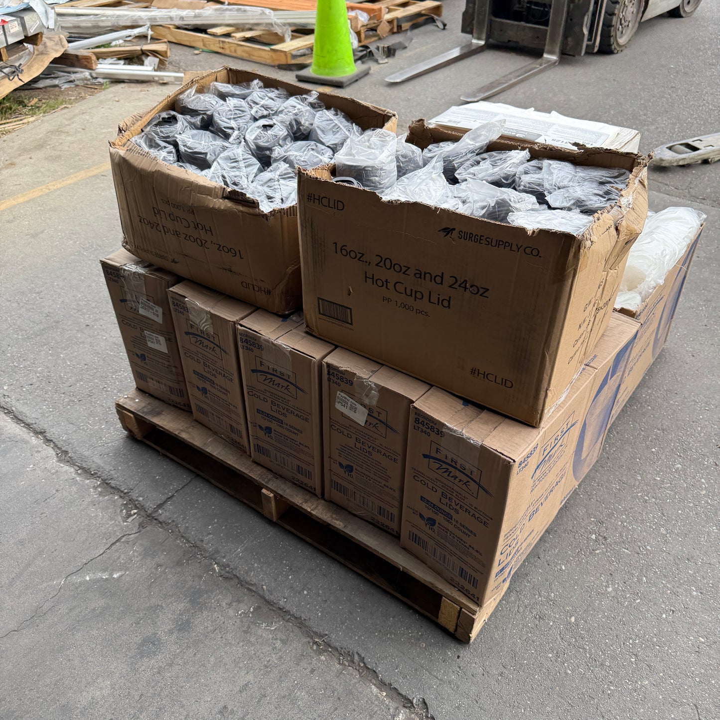 ZA@ Pallet of FIRST MARK Clear Lids, Black Hot Cup Lids, Tortilla Strips, & Toilet Seat Covers