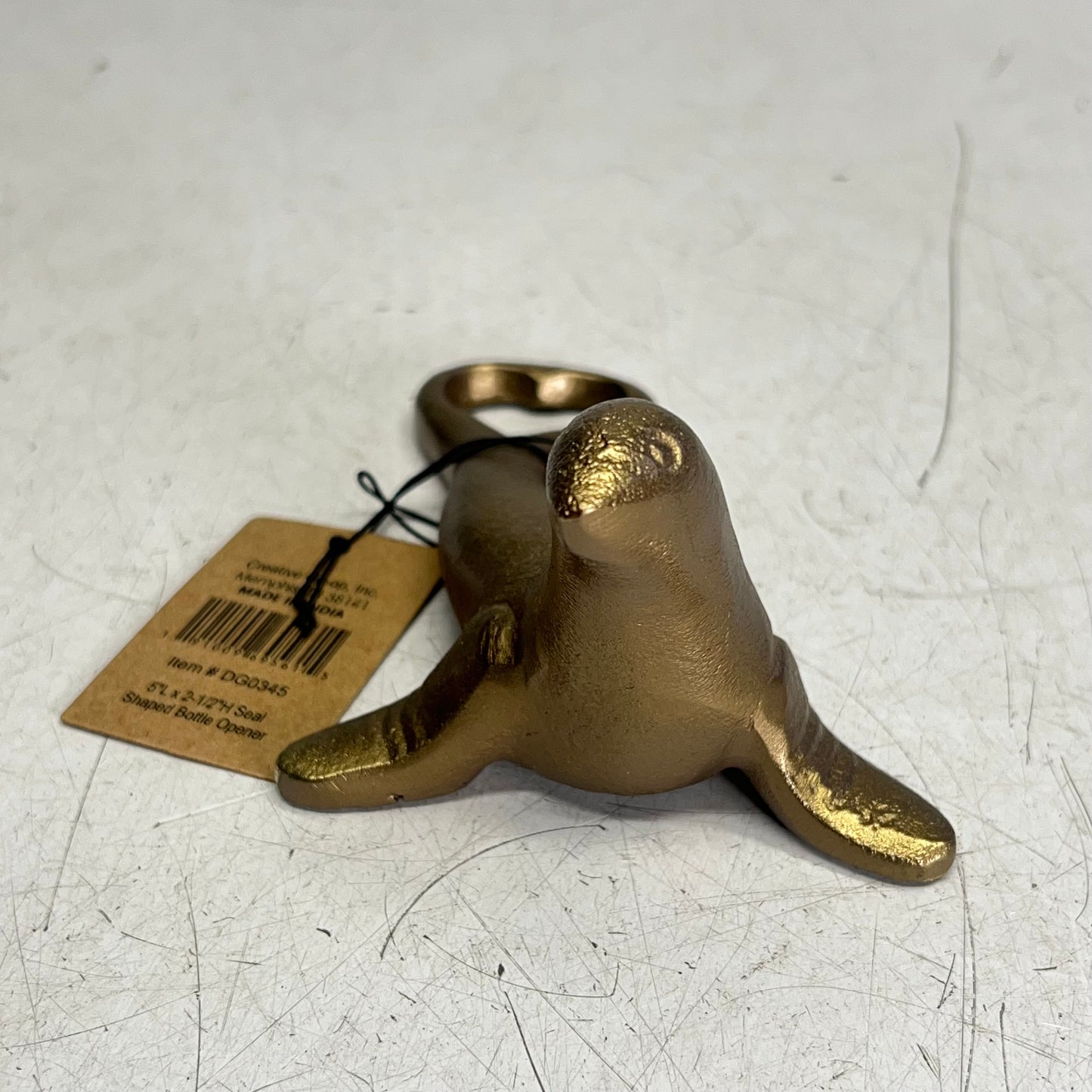 ZA@ CREATIVE CO OP Seal Shaped Bottle Opener  6" Antique Gold DG0345