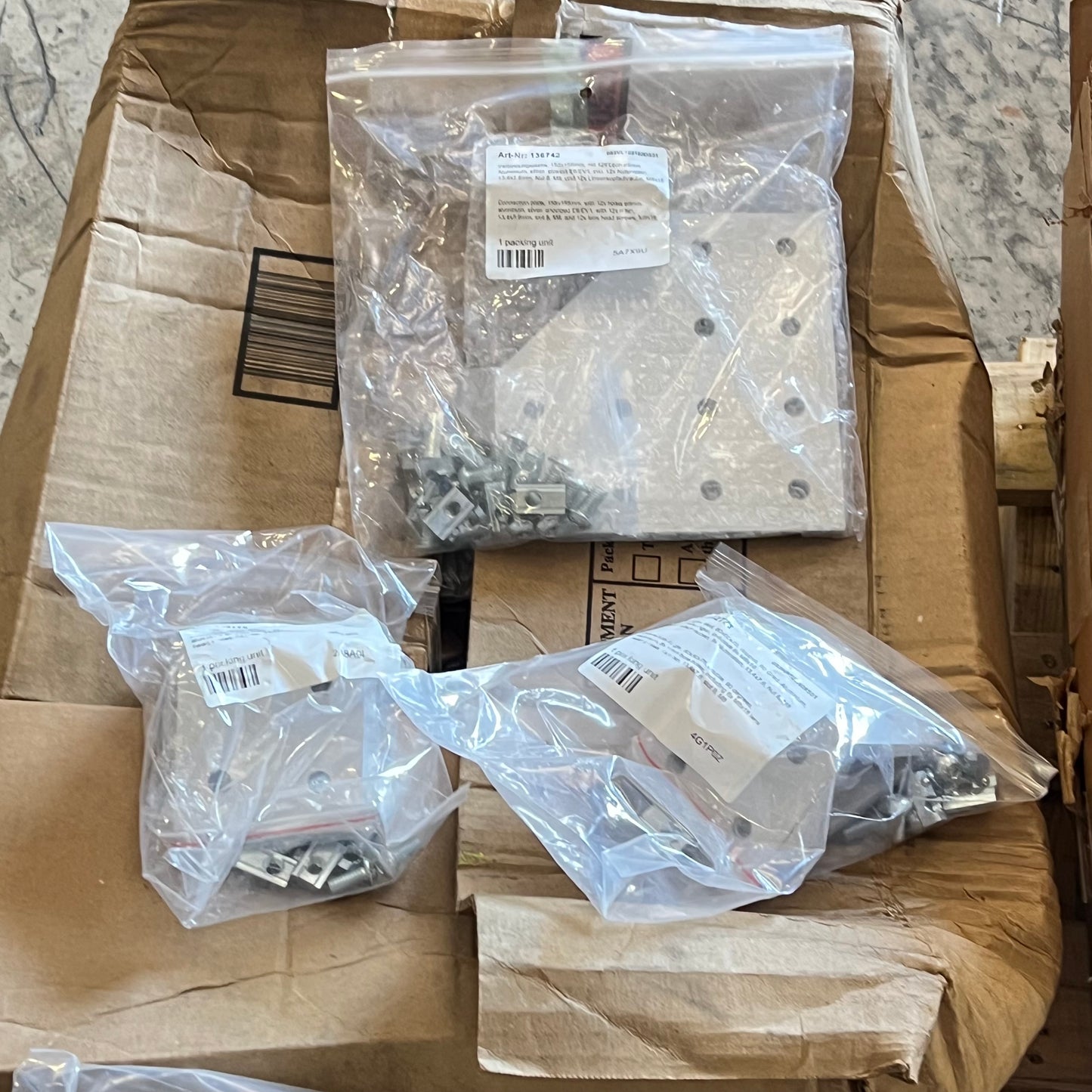 ZA@ Pallet of MIXED Hardware, Brackets, Plastic Tarp, Steel Horse Shoes, Lamination Sheets, & More!!!!! (AS-IS)