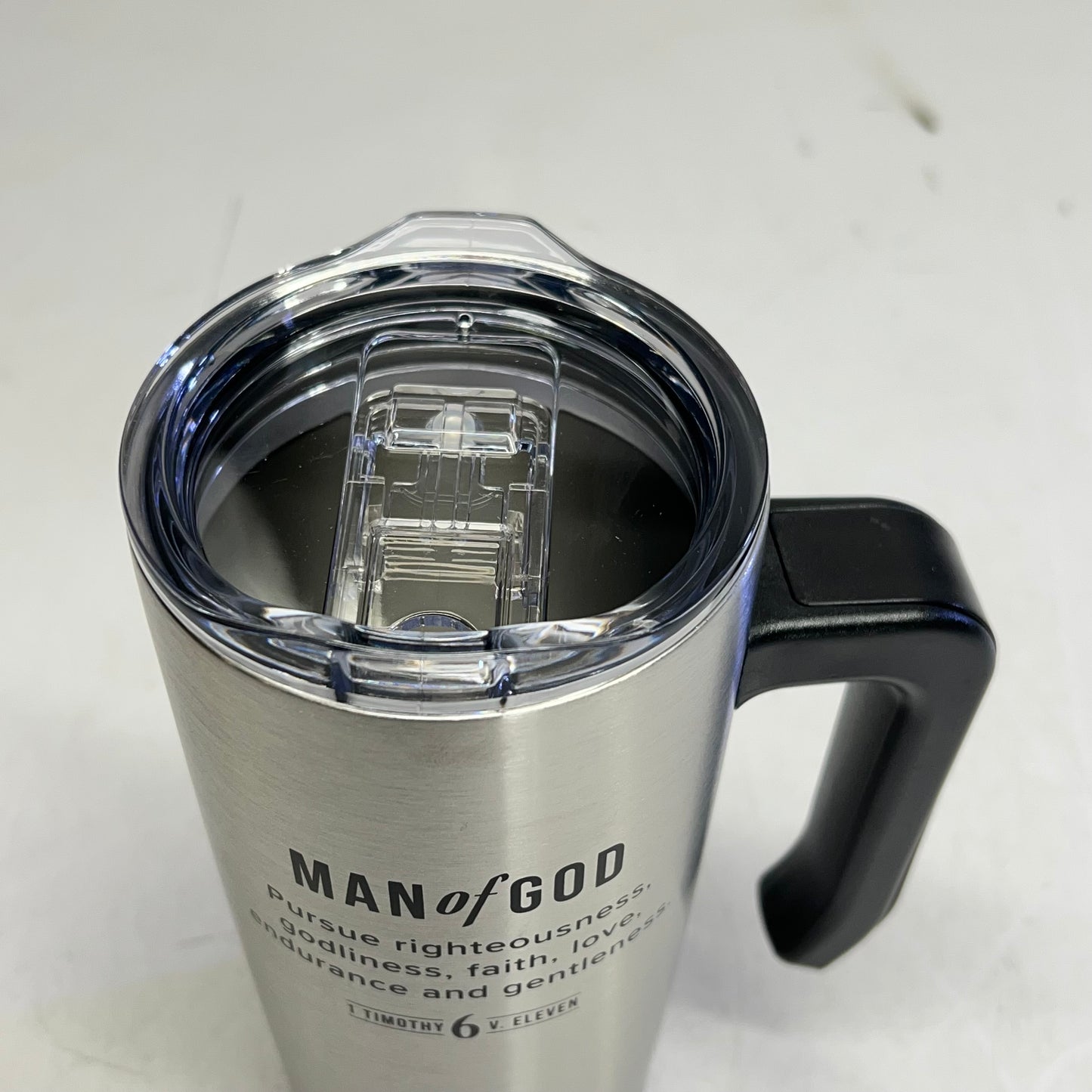 CHRISTIAN ART GIFTS Timothy 6:11 Travel Mug with Handle 18 fl oz Silver SMUG328