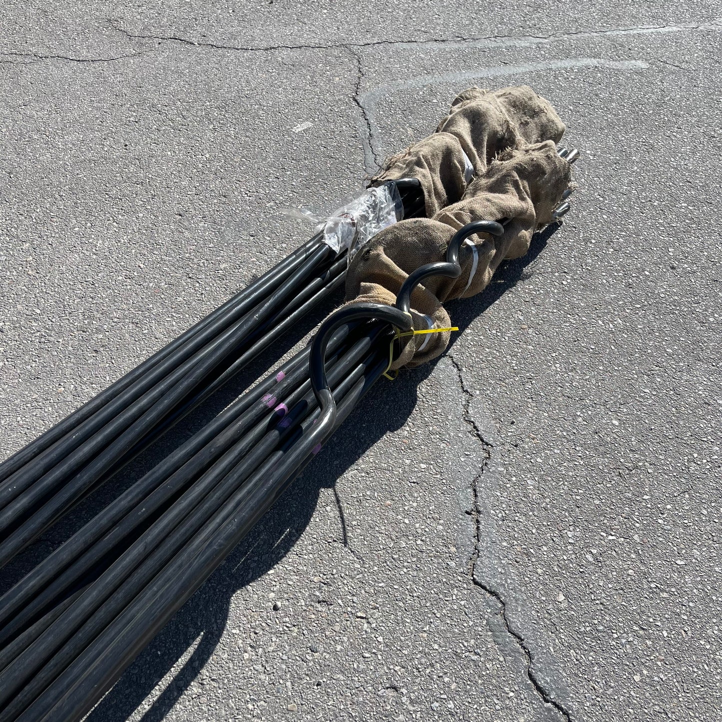 ZA@ Pallet of MIXED Long Black Plastic Pipe/damper/anchor? (AS-IS)