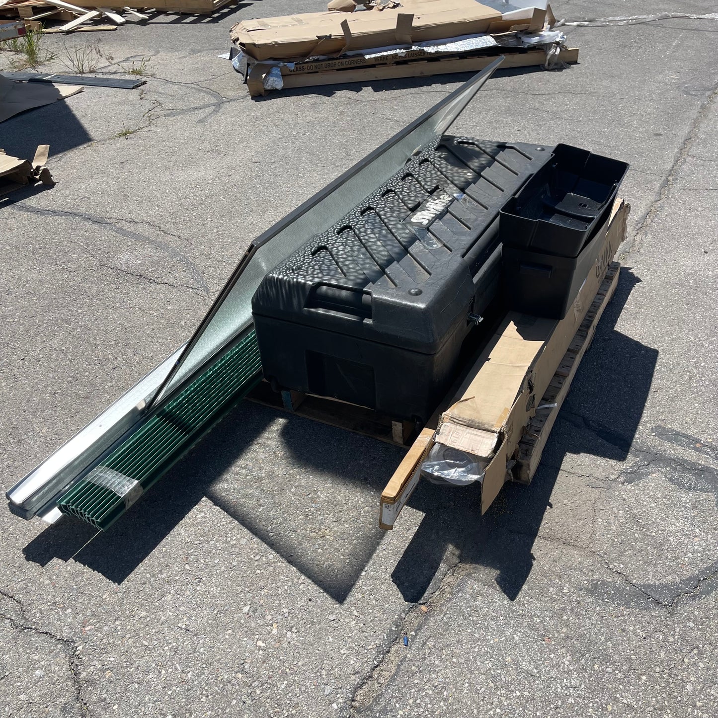 ZA@ Pallet of MIXED Glass Shower Door, Skyline Protective Case, Tool Boxes, & More! (AS-IS)