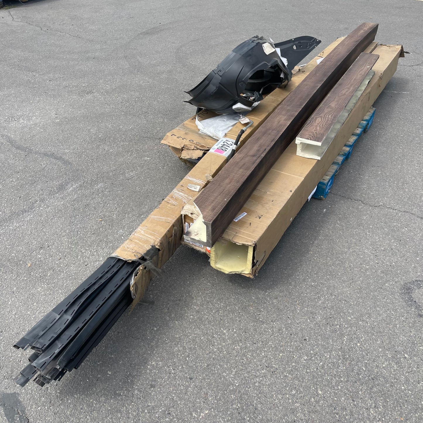ZA@ Pallet of MIXED Plastic Channels, Faux Wood Trim, Fender Liners, Shelf Parts, & More! (AS-IS)