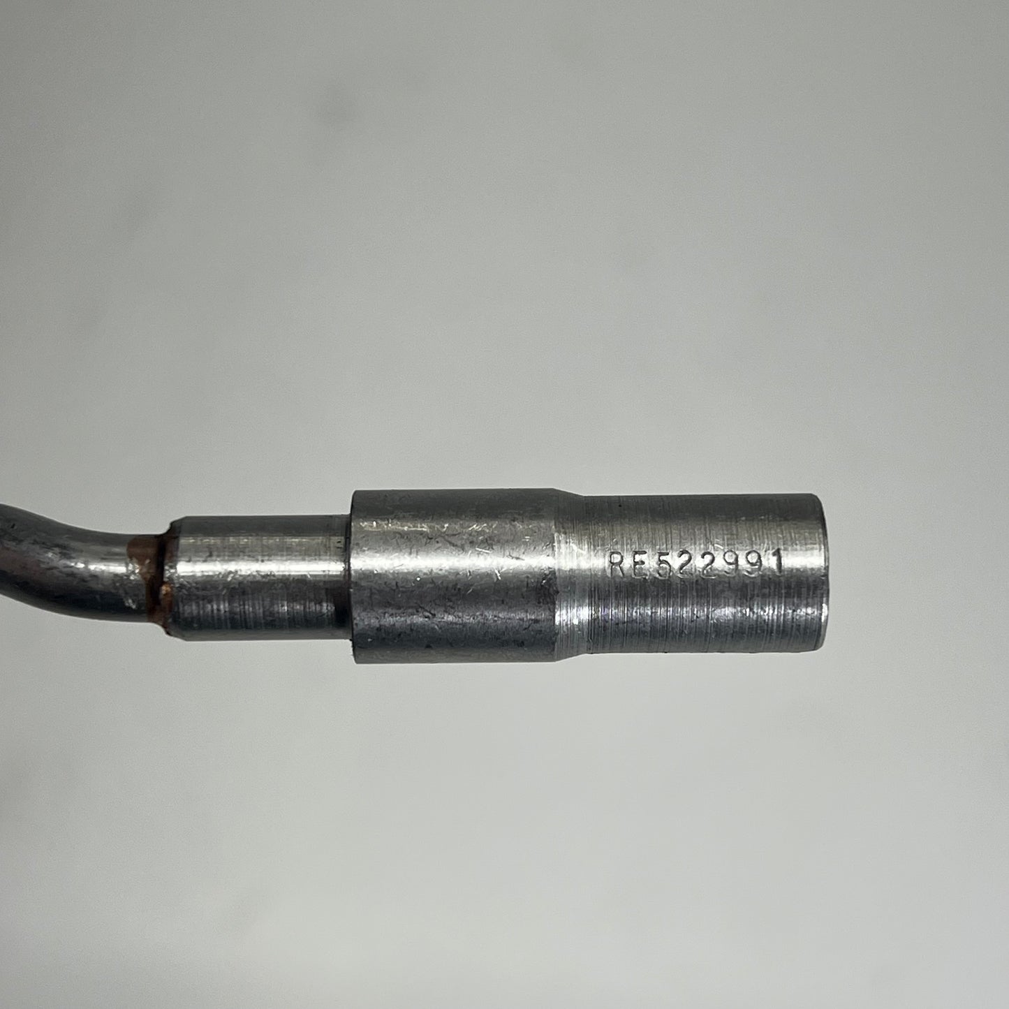 JOHN DEERE Genuine OEM Piston Cooling Orifice Tube Silver RE522991