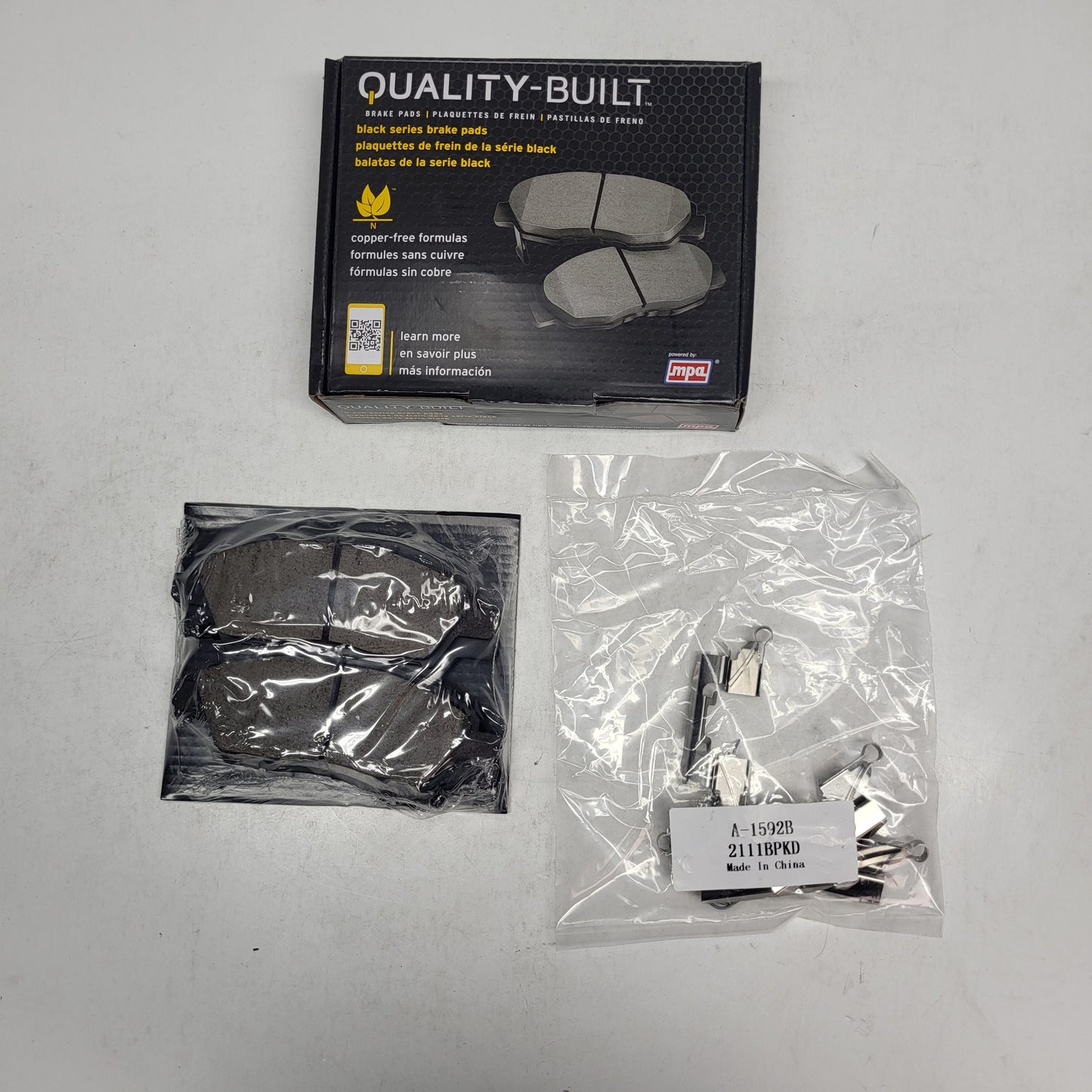 QUALITY-BUILT Ceramic Disc Brake Pad Set Black Front 1003-1592C